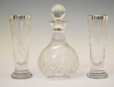 Lot 244 - Silver mounted cut glass decanter, and a pair of silver rimmed glass bud vases