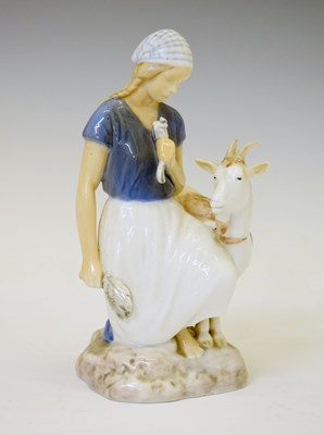 Lot 428 - Bing & Grondahl porcelain figure, Girl with Goat, pattern no. 2180