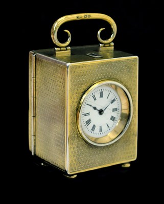 Lot 422 - Miniature silver gilt desk clock, Goldsmiths & Silversmiths Company, London, 1916