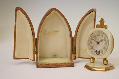 Lot 424 - French mother-of-pearl miniature desk clock, cased