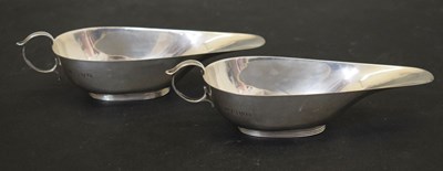 Lot 251 - Pair of George VI Art Deco style silver sauceboat