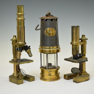 Lot 293 - Patterson Lamp Ltd miners safety lamp and two  E. Leitz Wetzlar microscopes