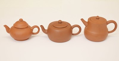 Lot 448 - Three Chinese teapots