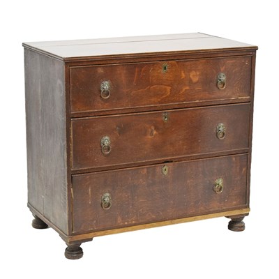 Lot 580 - Early 19th century oak chest of three drawers