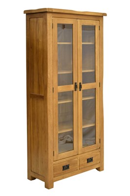 Lot 711 - Oak Furnitureland two door glazed display cabinet