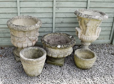 Lot 14 - Five assorted reconstituted garden urns, pots and planters