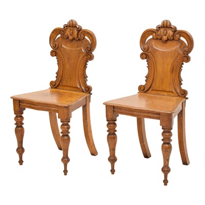 Lot 530 - Pair of Victorian carved oak hall chairs