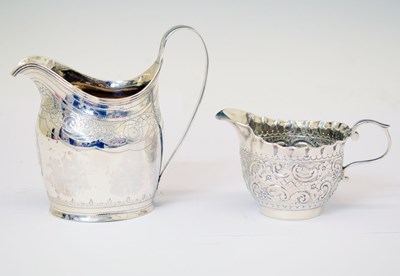 Lot 240 - George III silver helmet-shaped cream jug, and a late Victorian silver cream jug