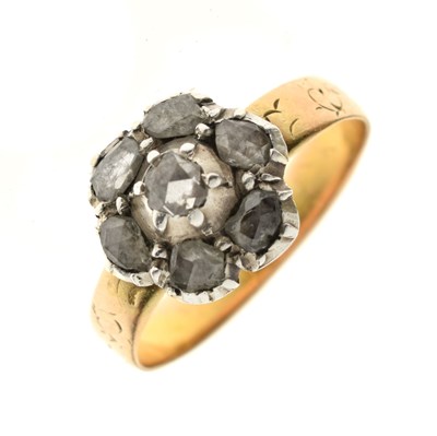 Lot 1 - Diamond 18ct yellow gold and unmarked silver set flower head cluster ring