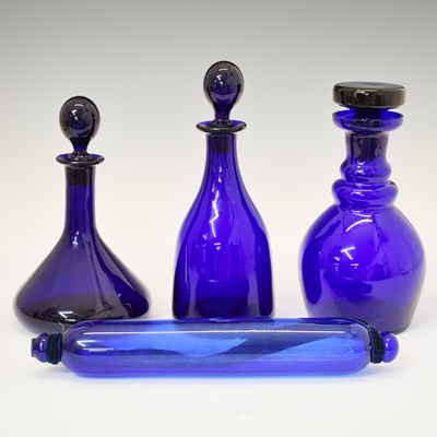 Lot 399 - Three 'Bristol Blue' glass decanters