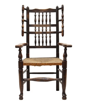 Lot 470 - 19th century Lancashire ash and elm spindle back wing armchair