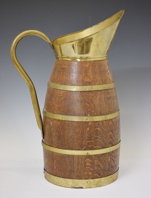 Lot 591 - Oak and brass coopered jug