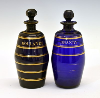 Lot 258 - Matched pair of blue glass decanters