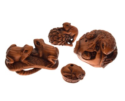 Lot 309 - Four Japanese carved boxwood netsuke