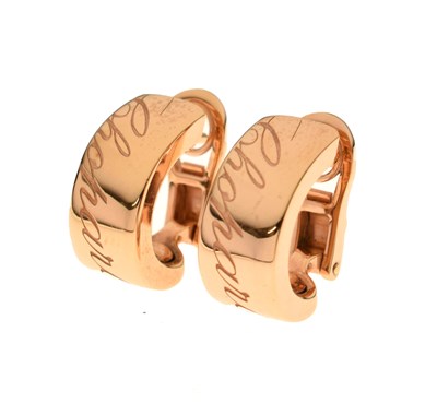 Lot 55 - Chopard - Pair of 18ct rose gold Chopardissimo hoop earrings