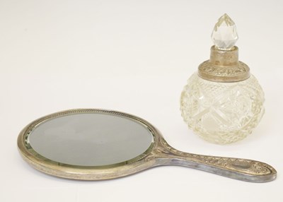 Lot 198 - George V silver-backed hand mirror and perfume bottle