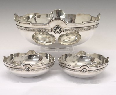 Lot 195 - Set of three George V silver bowls each having Tudor Rose cast banding