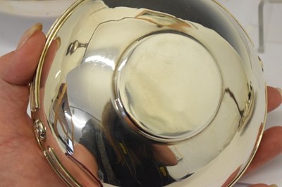 Lot 195 - Set of three George V silver bowls each having Tudor Rose cast banding