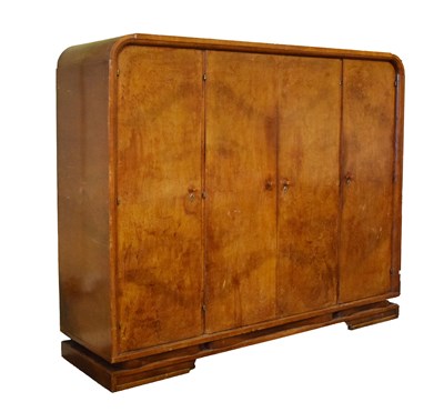 Lot 567 - Art Deco golden oak quadruple wardrobe