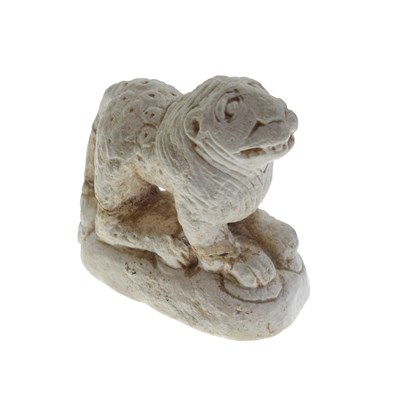 Lot 202 - Antiquities - Eastern miniature carved marble figure of a lion