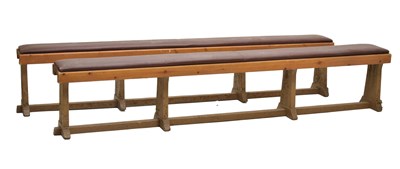 Lot 724 - Pair of 20th century pine-framed waiting room-style hall benches