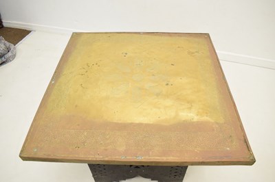 Lot 725 - Moroccan hammered copper occasional table