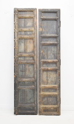 Lot 739 - Two Moroccan panelled and studded doors