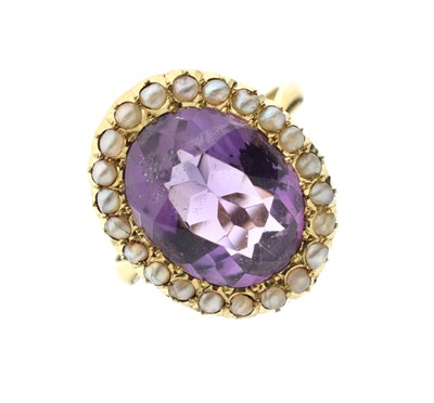 Lot 23 - Amethyst and seed pearl cluster ring