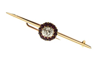 Lot 36 - Early 20th century diamond and ruby cluster yellow metal bar brooch