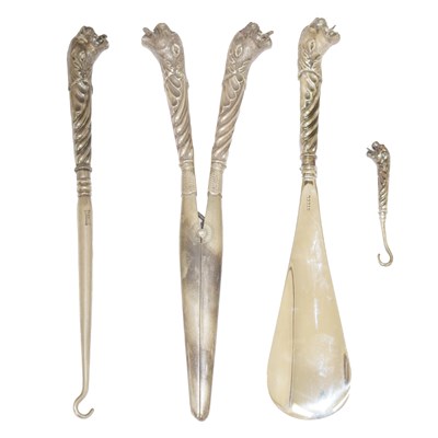 Lot 87 - Late 19th/early 20th-century silver handled lady's four-piece accessories set