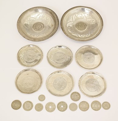 Lot 245 - Set of six Sudanese white-metal coasters, two coin dishes, and a quantity of loose Sudanese coins