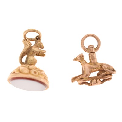 Lot 93 - Squirrel fob and greyhound terminal