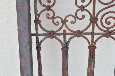 Lot 65 - Moroccan wrought iron and wood framed Riad window grille