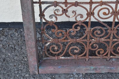 Lot 65 - Moroccan wrought iron and wood framed Riad window grille