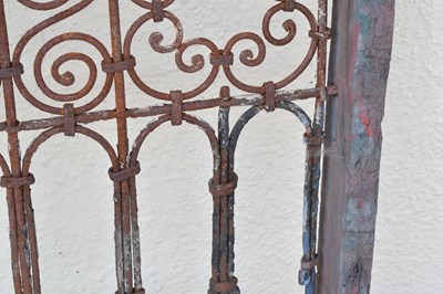 Lot 65 - Moroccan wrought iron and wood framed Riad window grille