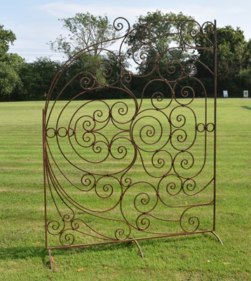 Lot 21 - Large wrought iron scrollwork screen or divider