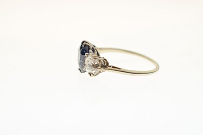 Lot 13 - Sapphire and diamond white metal three-stone ring