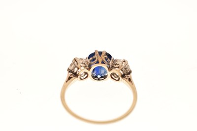 Lot 13 - Sapphire and diamond white metal three-stone ring