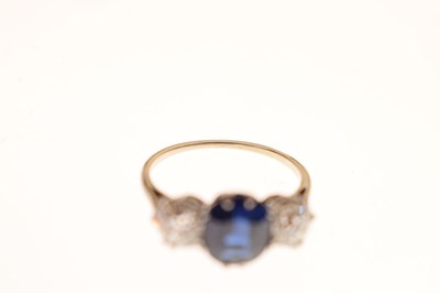 Lot 13 - Sapphire and diamond white metal three-stone ring