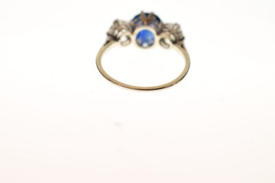 Lot 13 - Sapphire and diamond white metal three-stone ring