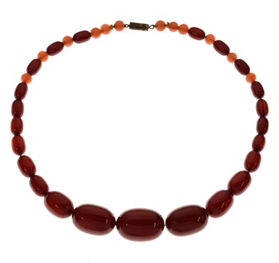 Lot 64 - Cherry amber Bakelite and glass bead necklace