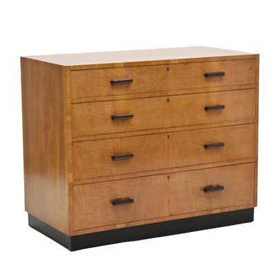 Lot 653 - 1930s walnut and ebonised chest of four long graduated drawers