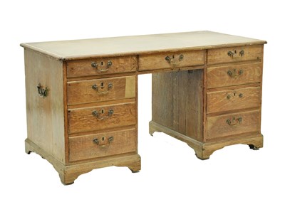 Lot 661 - 19th century oak twin-pedestal desk