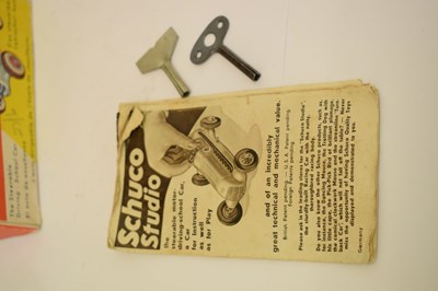 Lot 422 - Schuco - Two tinplate clockwork motor vehicles