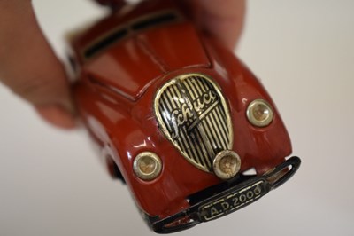 Lot 422 - Schuco - Two tinplate clockwork motor vehicles