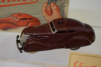 Lot 422 - Schuco - Two tinplate clockwork motor vehicles