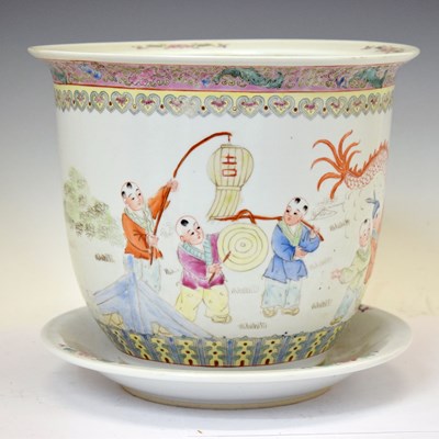 Lot 521 - 20th century Chinese Canton Famille Rose porcelain jardinière or planter and stand