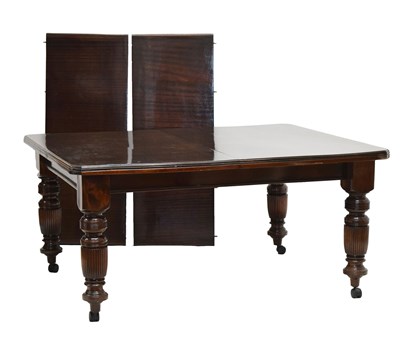 Lot 700 - Edwardian mahogany extending dining table