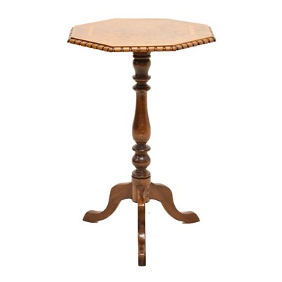 Lot 674 - Figured walnut octagonal occasional / wine table