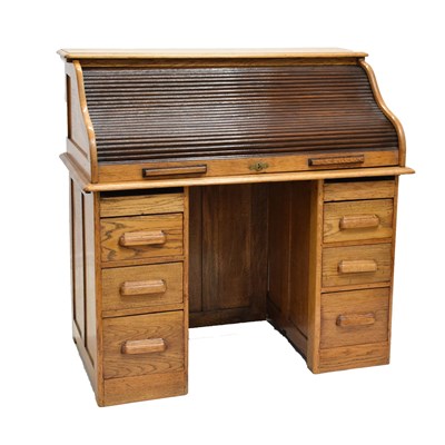 Lot 746 - Early 20th century oak tambour-front twin pedestal desk